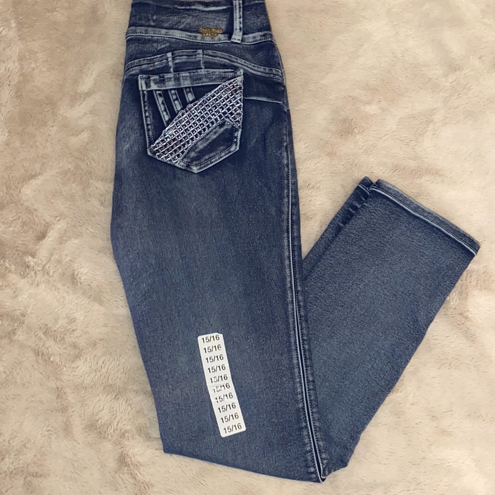 Stretch tush push up Denim size 15/16  rhinestone back  pockets